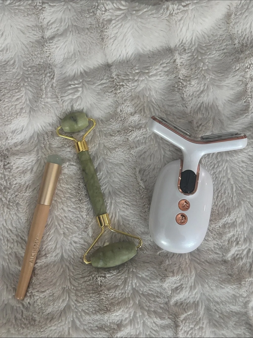White and Rose Gold Facial Massager and Green Jade Roller Set